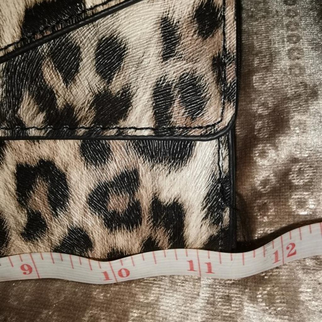 Glam animal print clutch used once
