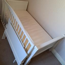 white wooden cot bed with a mattress for sale.
got all the pieces and screws and bolts to turn into a cot. it then turns into a toddler sized bed.
few marks and scratches but could be sanded and painted.
mattress cover can be taken off to be washed. has always had a mattress protector on though.
would accept sensible offers. thanks.