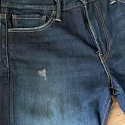 Levi Jeans -Never worn - Designer rip as shown on photo