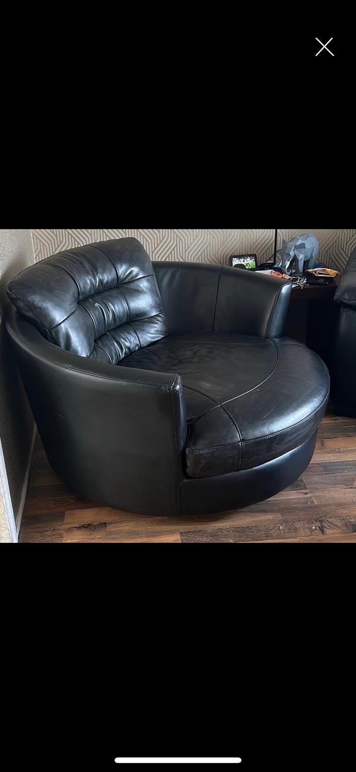 Black leather cuddle online chair