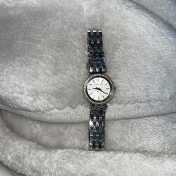 Women’s watch. 2 links have been removed which I don’t have. Worn a few times.