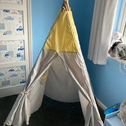 Large grey and yellow tent