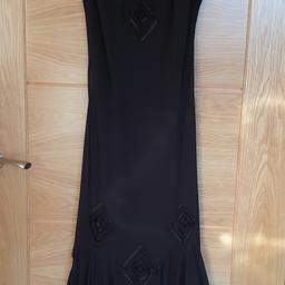 Ladies Size 10 Per Una Calf Length Black Elegant Party / Evening/ Cocktail Dress

Ladies Size 10 Per Una Calf Length Black Elegant Party / Evening/ Cocktail Dress. Calf Length, Black with unique designer pattern (see photos) Suitable for Party/Formal/ Cocktail/ Special Events.  Material is 97% Polyester 3% Elastane . Polyester lining.
Never Worn - 'As New' Excellent Quality