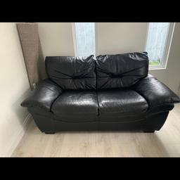 Black real leather sofa and storage footstool bought from DFS. In immaculate condition hardly used. Paid around £1800 for both. Offers welcome