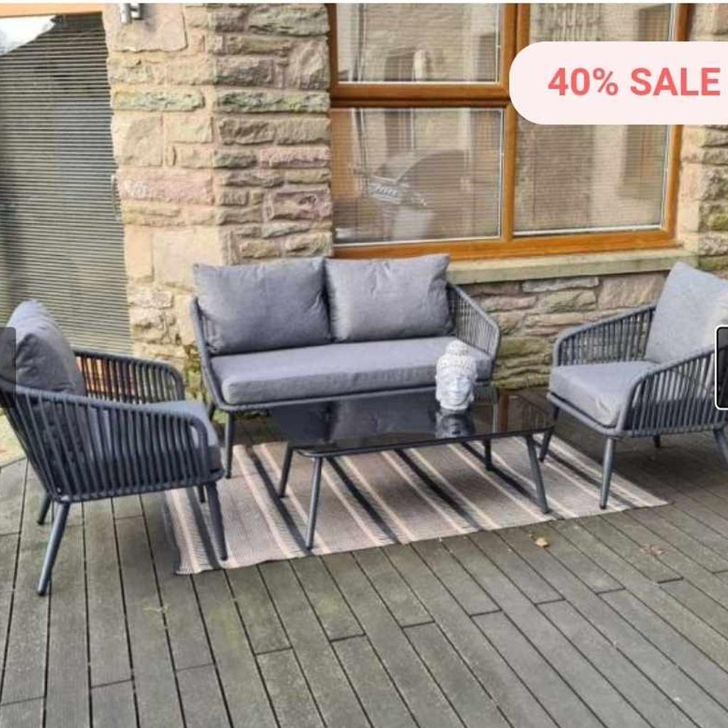 MARIANO 4 PC LOUNGE SET

All Weather Rope Weave over a powder coated aluminium frame in Anthracite colour with Toughened Glass Black Table Top. Completely maintenance free and can be left outside all year round.
2 Seat Sofa in All Weather Rope Weave with All Weather Cushions.
2 x All Weather Rope Weave Armchairs with All Weather Cushions.
Coffee Table
No Maintenance Required.
This is brand new in box and retails for £999 but is currently on sale for £599.99 I'm selling for £300 why not check out my other items for sale