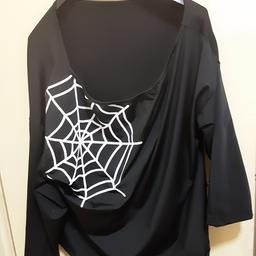Halloween top for fancy dress or Halloween night. Excellent condition only worn once for a couple of hours. It's great to put away for next Halloween, and you're sorted.