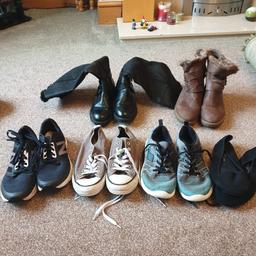 black boots 
brown boots 
black new balance trainers 
grey converse
blue and grey LA gear trainers
black George flat shoes 

all in good condition from a smoke and pet free home