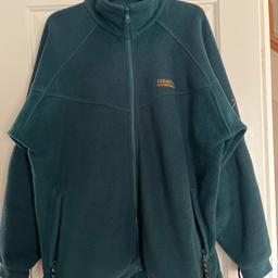 Bottle green ladies fleece jacket, with front zip and pockets, size Medium by Regatta.
Worn a few times but has been washed and is still in good condition.