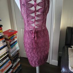 Pink lace sexy party dress from Topshop in size 12. In a very good condition