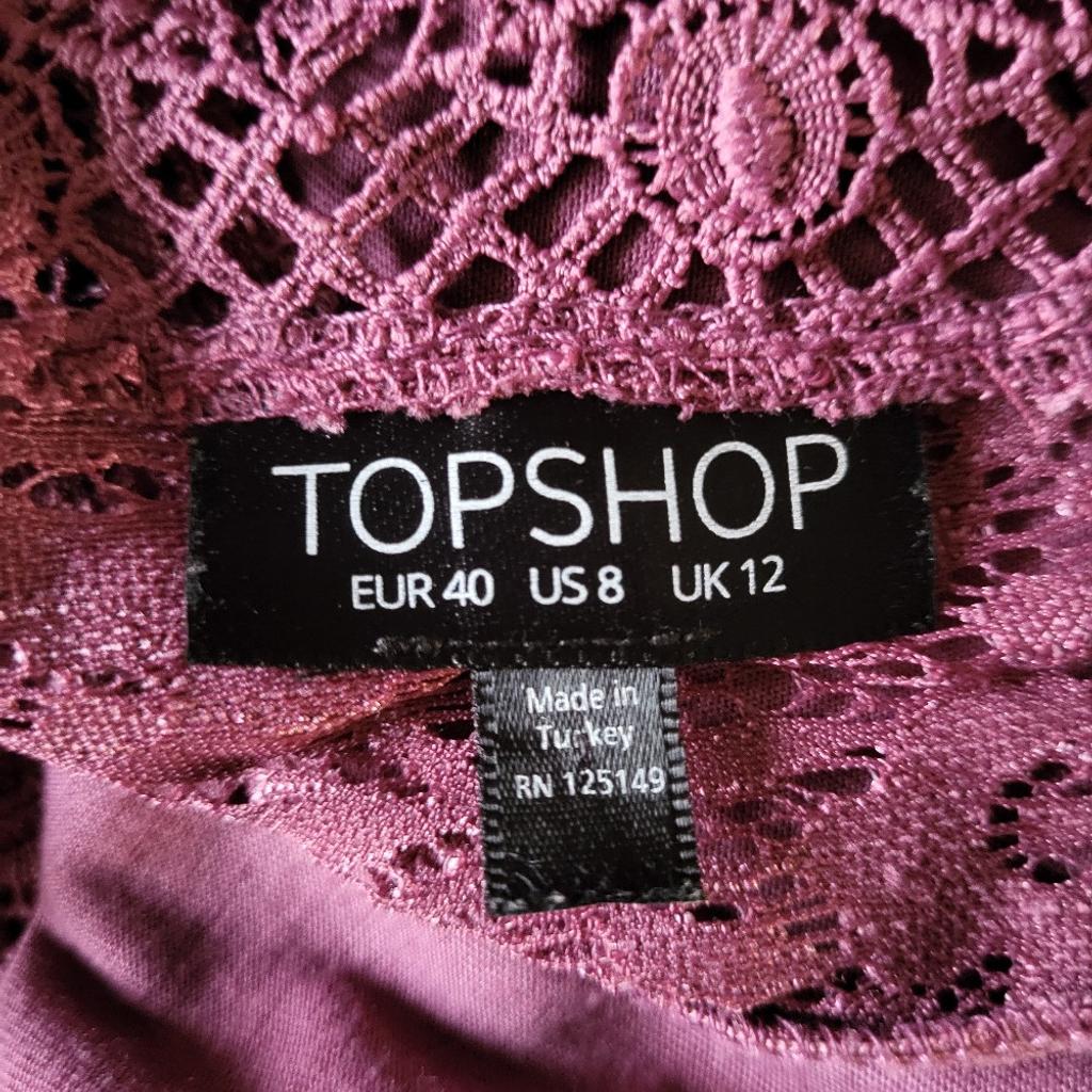 Pink lace sexy party dress from Topshop in size 12. In a very good condition