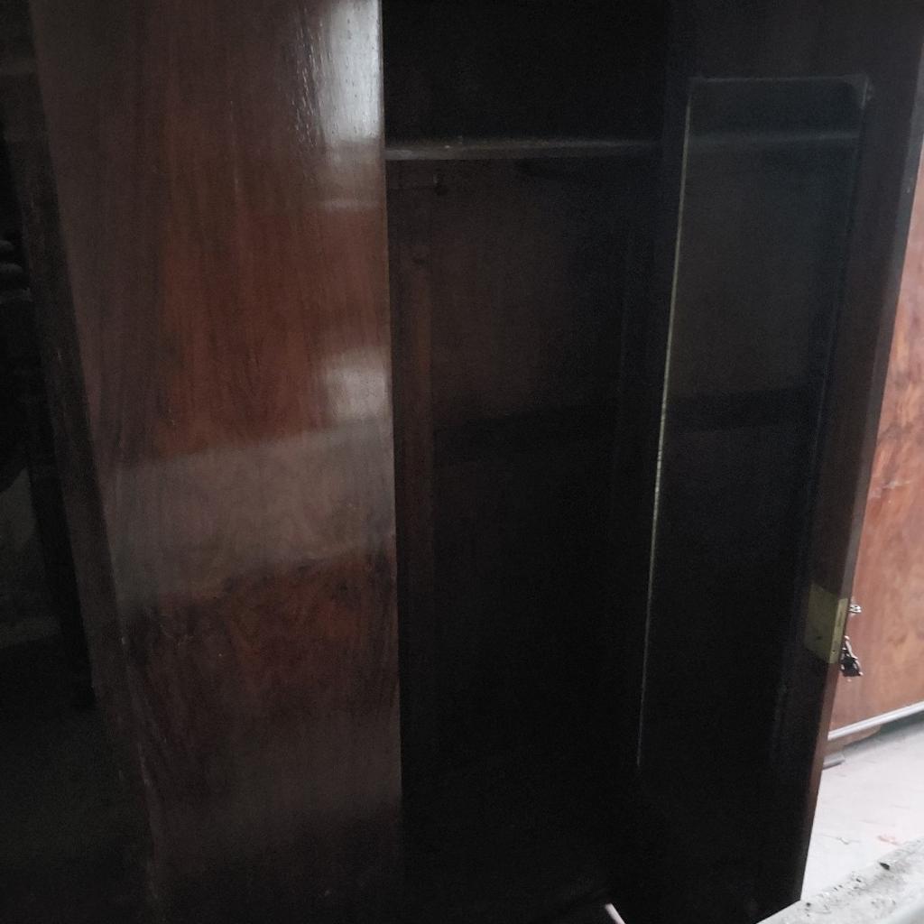 Nice vintage wardrobe, possibly a good refurbishment project.

Scratch on main door visible in photo.

Size available on request.