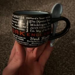 Set of two novelty miniature mugs with matching spoons depicting areas and attractions of York