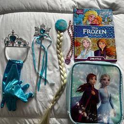 Iam selling a like new Frozen lunch bag used once. Please see photos of the bag and 
Disney Frozen look and find book in like new condition and a few Frozen accessories. 

Preloved items in excellent condition