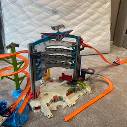 Hot Wheels Ultimate Car Garage with Sounds. Fully working in excellent condition. Other Hot Wheels items/track can be added. This is a great item where children can play with it for hours. From smoke and pet free home.