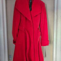 New tagged red coat size 10 from the atmosphere.big collar hidden buttons Mock button cuff photo 4 shows the hidden buttons. Inside button as shown matching belt. Length from arm pit 25 inches. Materiel content photo 7. Pet n smoke-free home. collection ip3 or posting at your cost