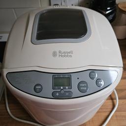 Brand: Russell HobbsColor: WhiteFeatures: Comes with 12 programmable functions and a 13 hour delay bake timer Complete with a 7 minute power cut-off memory function Has an automatic keep warm function for 1 hour Large viewing window with LCD display and non-slip feet