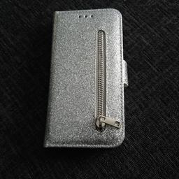 samsung galaxy s7 phone cover brand new never used zip for money etc silver glitter outside has card holder and photo space inside