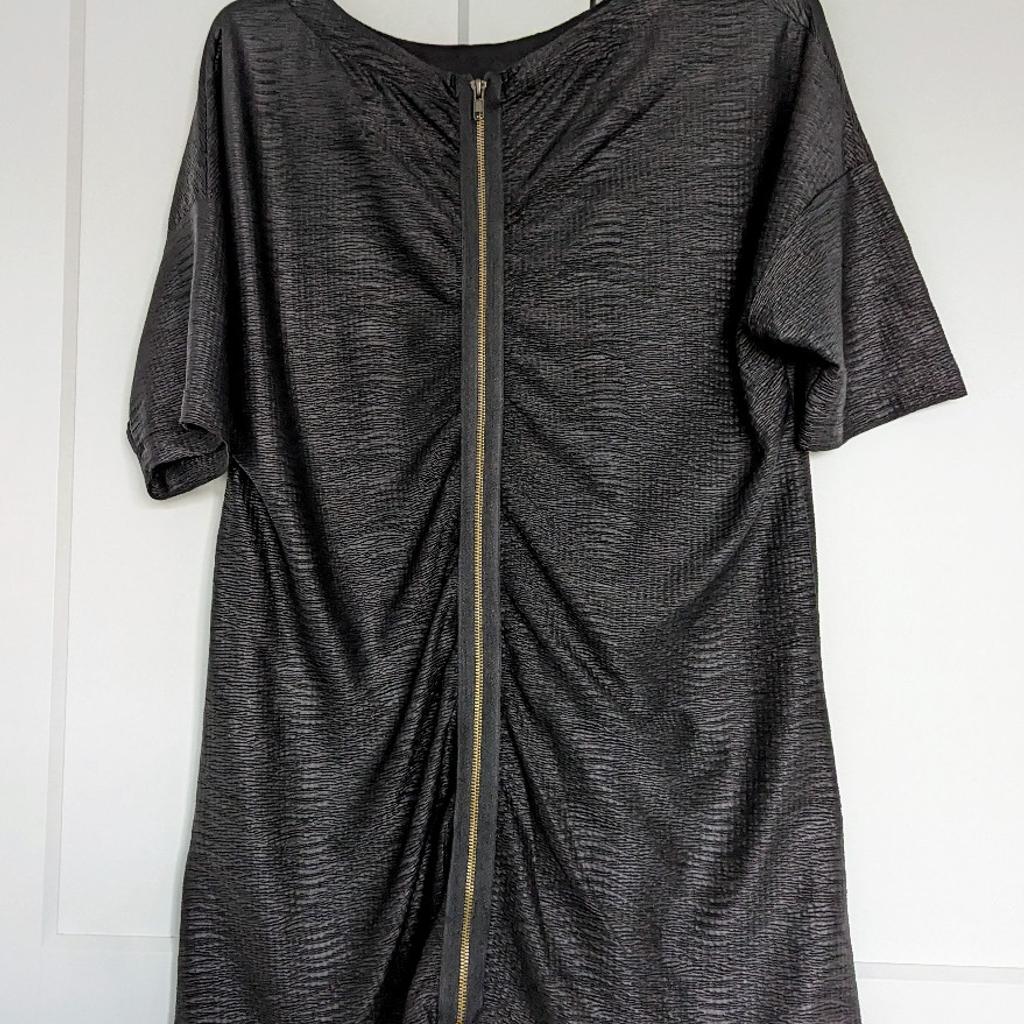 Zara
black wet look long top
size s worn once

collection only