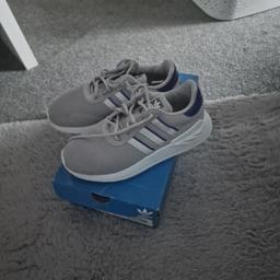 Colour grey and blue. In very good condition
