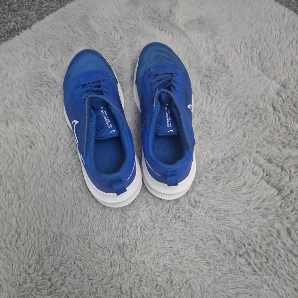 Nike trainers in blue and white, size 2.5