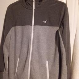 Great hooded hollister full zip jogger jacket with zip pockets, great condition and like new. size small for either men or women. collection only please.