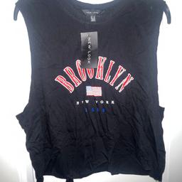 New Look “Brooklyn New York” tank top with open sides.
New with tags.
Size 16.