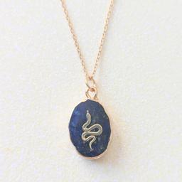 Lapis Lazuli Crystal Snake Gold Charm Necklace
On gold plated chain fastened with a lobster clasp
Necklace will come in a velvet drawstring bag
Perfect as a gift
Check out Starrr Jewellery on Instagram 
Collection from Coulsdon or I can post for an extra £2.05
