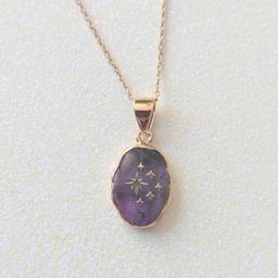 Amethyst Crystal Stars Gold Charm Necklace
On gold plated chain fastened with a lobster clasp
Necklace will come in a velvet drawstring bag
Perfect as a gift
Check out Starrr Jewellery on Instagram 
Collection from Coulsdon or I can post for an extra £2.05
