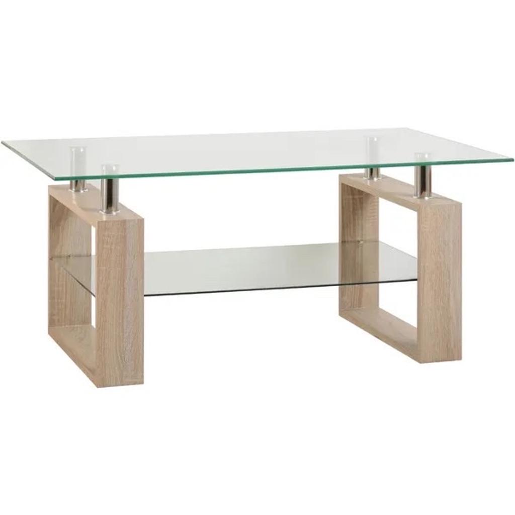 The Milan Glass Top Coffee Table blends modern design with traditional robustness to create this piece. The Milan range features a modern tempered glass table top which sits on a chunky sonoma oak effect finished wooden frame for the perfect contrasted look.

Assembly
Full Assembly Required (Flat Pack)
Product Dimensions
H 46cm x W 100cm x D 60cm
Shelf Dimensions: H 27cm x W 80cm
Leg Height: 18.5cm
Brand
Seconique
Packaging Dimensions
Box 1: H 5cm x W 103cm x D 62cm, 18kg
Box 2: H 24cm x W 54cm x D 39cm, 5kg
Care Instructions
Wipe clean with a soft cloth
Composition
glass, MDF, Metal, 3D paper veneer
Pack Contents
1 x Coffee table, Fixings and assembly instructions
Finish
Oak