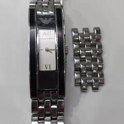 beautiful armani watch with extra bracelet to add to strap. Good worn condition.with new battery, no.box