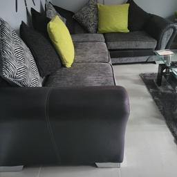 Corner suite, comes apart into 2 sections, green cushion covers reveal original grey monochrome covers, I added the green covers, really great condition, no pets. please note my sofa is not a sofa bed.
