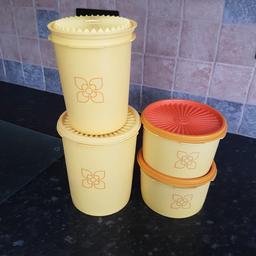 4 tupperware containers with lids