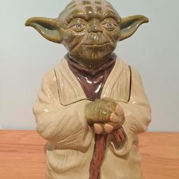 Yoda cookie jar. No damage. 

Has been used years ago, only sign of use is some cookie crumbs stuck in the toes 😂. 

Box shows sign of wear from storage, polystyrene packaging still in box. 

Collection only Tamworth, sorry will not post it. No offers.