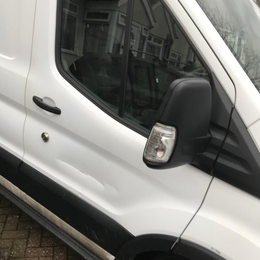 New shape ford transit mk8 drivers side door. This door comes fully complete with everything including the mirror as well hence absolute bargain and ready to bolt straight on to your vehicle. As see in photo has small dent and light scrap which I believe would mostly come out with a polish. Collection only from ruislip west London. Please call for anymore info on 07968 625 857, thanks.