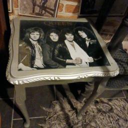 silver wooden side table upcycled with queen picture under a glass top sprayed silver