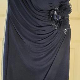 Jane Norman navy party dress, with side ruffle and flower detail. In excellent condition, worn only once. Ideal for a party/prom/ formal occasion. Please see my other adverts.