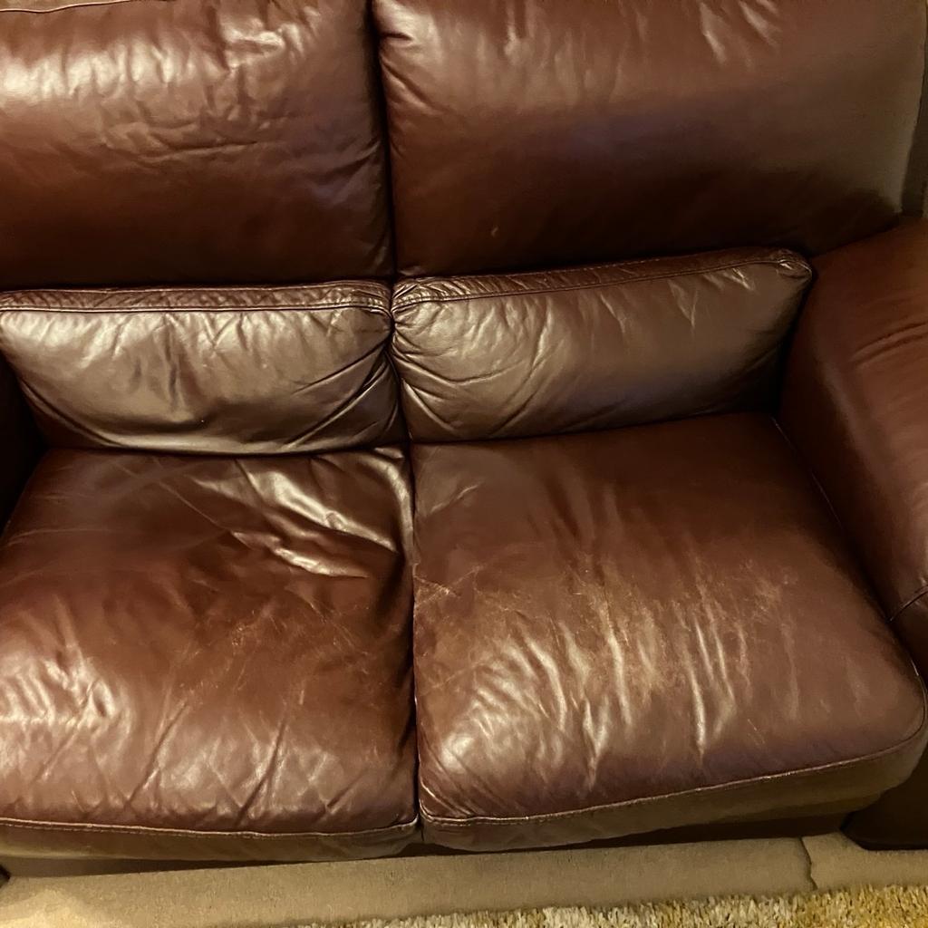 Two seater leather sofa with chair and foot stool. Will sell separately. Open to offers