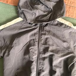 Worn a few times 
Lightweight shell tracksuit with zip up hooded jacket