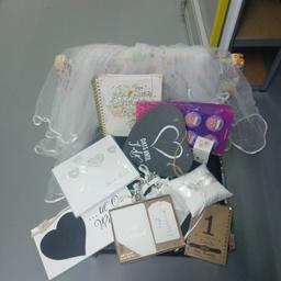 Wedding bundle, includes 2 x veils, guest book, just married passport holder and luggage tag set, ring satin cushion, confetti, wedding planner book, table cards, hen night badges x 2 packs, days to go slate heart and chalk, till our wedding board , 4 x beaded bows in pouch, 10 x hair pins with diamante detailing, bargain