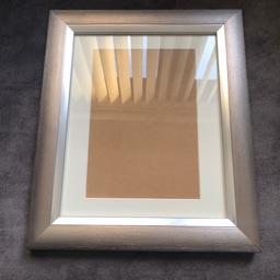 Photo frame
Brushed silver effect
Will take photo 10” x 8”
Also comes with border, it will reduce photo size down to 8” x 5.5”