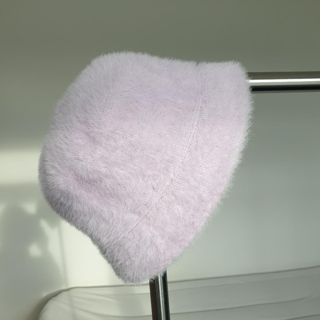 Pretty and fluffy winter hat. Very good condition, selling as it's too small for me, I wear L and it's probably M.