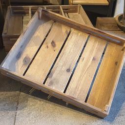 Sturdy wooden trays. Ideal for greenhouses, sheds or even indoors. 
46.5 × 58cm 7.5cm deep. Wood is 1cm thick. Would look nice stained for use on the outdoor furniture in BBQ season
5 available