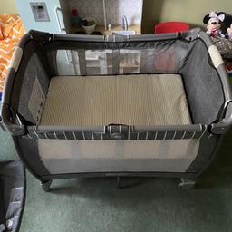 Great travel cot, suitable for new born - approximately 3 years old.

It comes with:

- Raised bassinet ( ideal for new borns so you don’t need to bend so far down)
- Side light / music and vibrating gadget
- Toybar
- Changing mat
- travel bag

We have everting as shown on the Amazon pic I just didn’t take pictures of the items