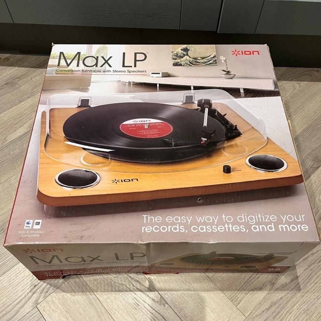 Max LP turntable with stereo speakers.
Bought as a gift and only used a couple of times, still in original packaging