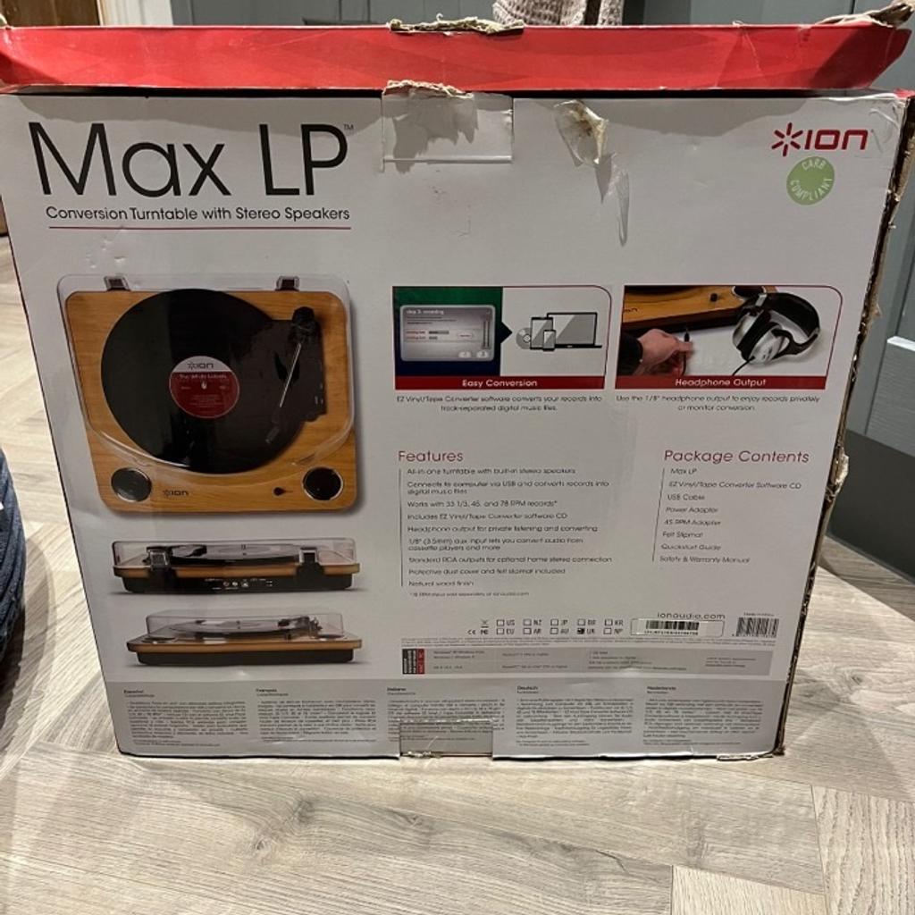 Max LP turntable with stereo speakers.
Bought as a gift and only used a couple of times, still in original packaging