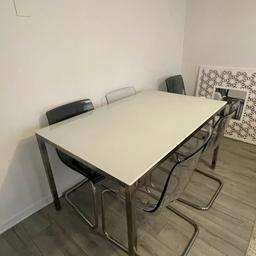 IKEA glass dining table with 4 chairs in good condition. 
Open to offers.