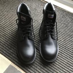 Brand new steel toe capped work boots, A big fitting size 12, in black, from a clean pet and smoke free home, collection only