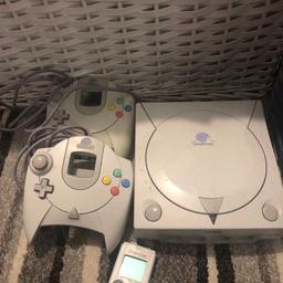 Dreamcast and games, 2x controllers one is a little yellow and one is not coloured at all, 1x VMU not coloured, console is not coloured, includes all cables, everything works and original games come with manuals, there is also 32 ‘backed up’ games, boot loader disc, and dream key for internet access,