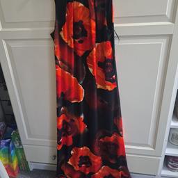 Ladies size 12 red flower design full length dress. 

From Roman 

Only worn once or twice. 

Collection from TW13 or post at extra cost 

From a smoke and pet free home 

£10