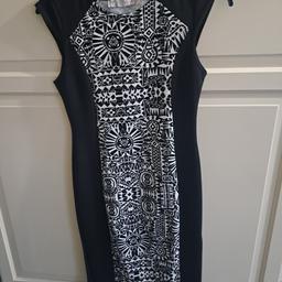 Black and white aztec style dress from New Look. 

Size 12 

In good used condition 

Collection from TW13 or post at extra cost 
From a smoke and pet free home 

£5